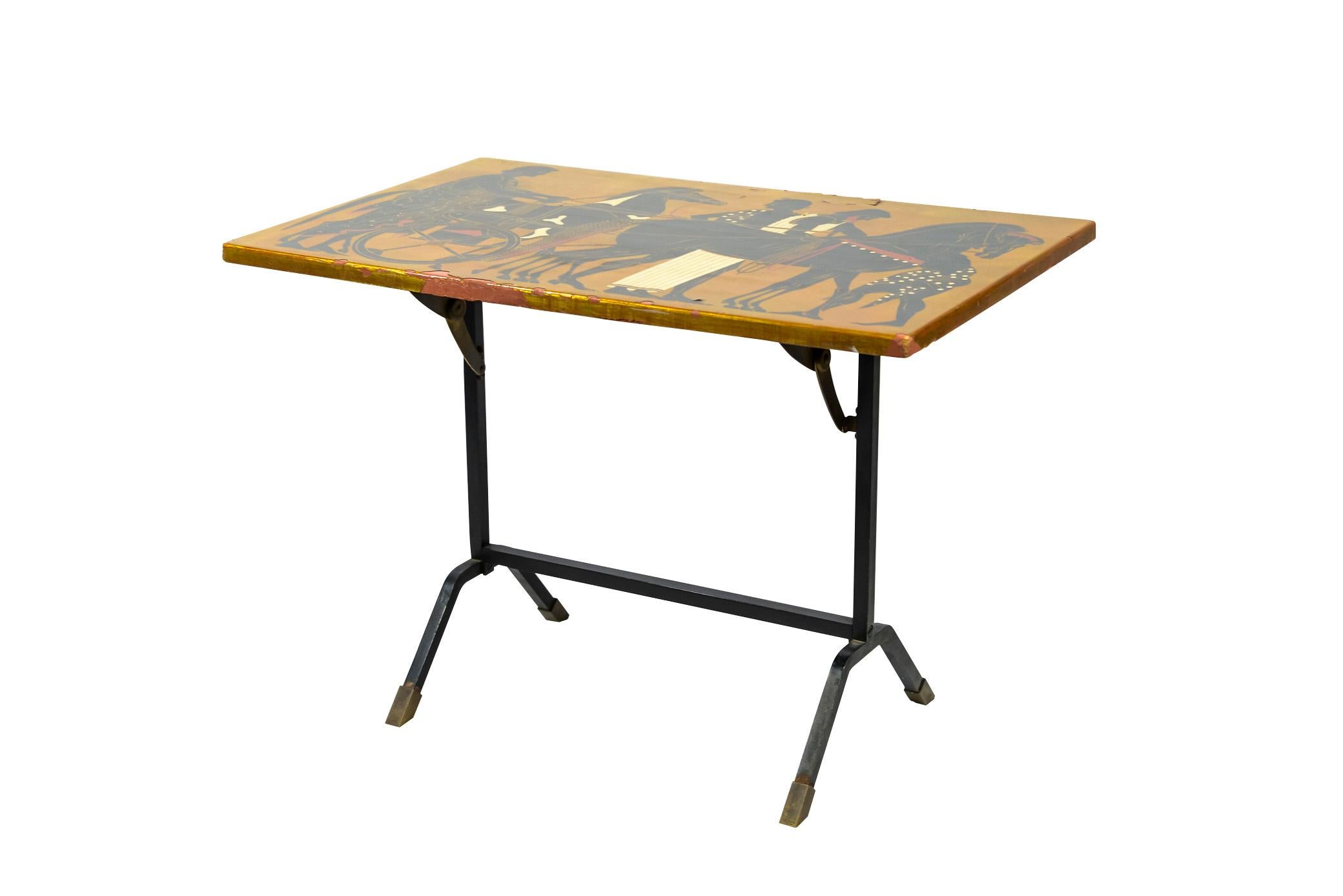 Coffee Table with removable iron top,
The lacquer tray decorated with a Greek scene, 
circa 1980.
Measures: Width 62 cm, Depth 38 cm, Height 43 cm.