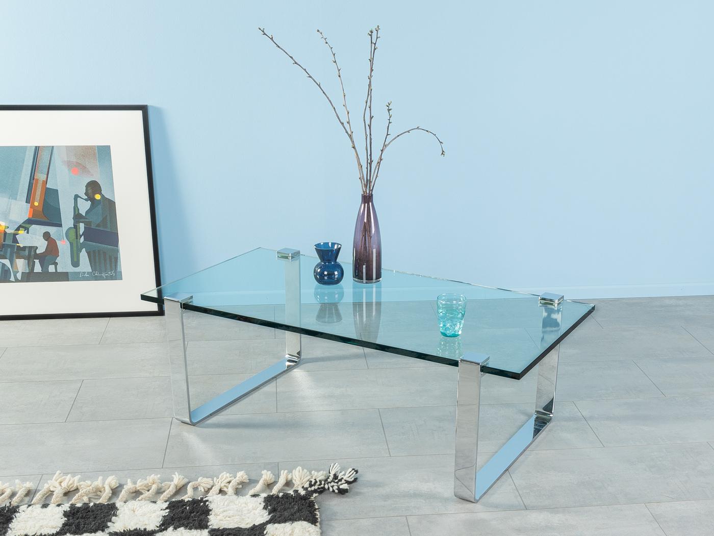 Rare coffee table K 831 by Friedrich Wilhelm Möller for Ronald Schmitt from the 1970s. 19mm thick glass top with high quality stainless steel frame.
Quality Features:

 very good workmanship
 high-quality materials
 Made in Germany. Design: