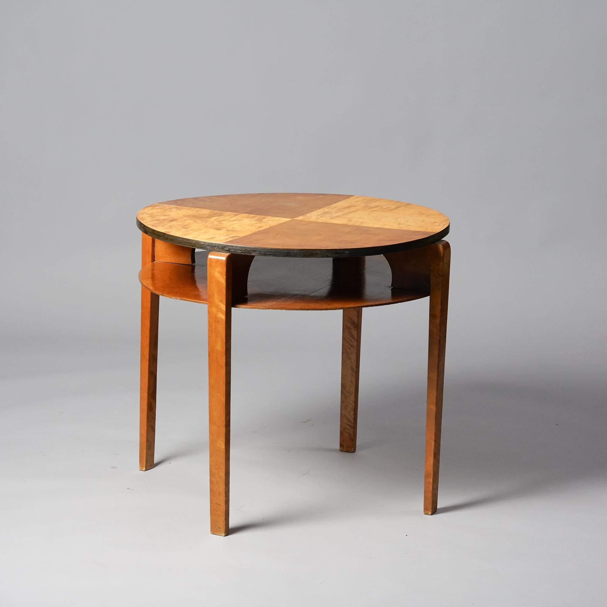 A rare coffee table designed by Ilmari Tapiovaara in 1940s. Manufactured by Keravan Puuteollisuus. Coffee table is made from birch. Wear consistent with age and use. 