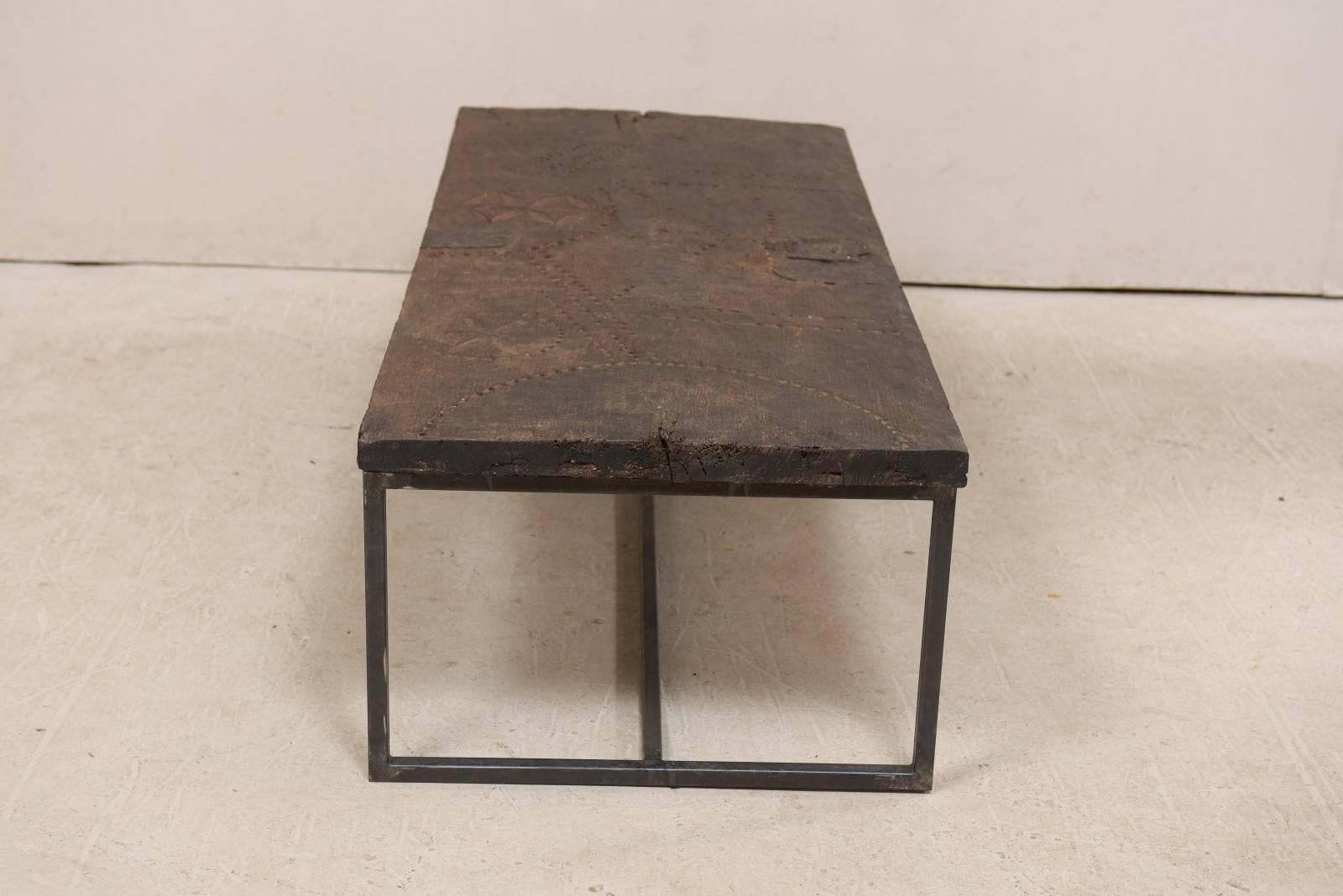 Carved Coffee Table Made from 18th Century Spanish Wood Door and Custom Iron Base