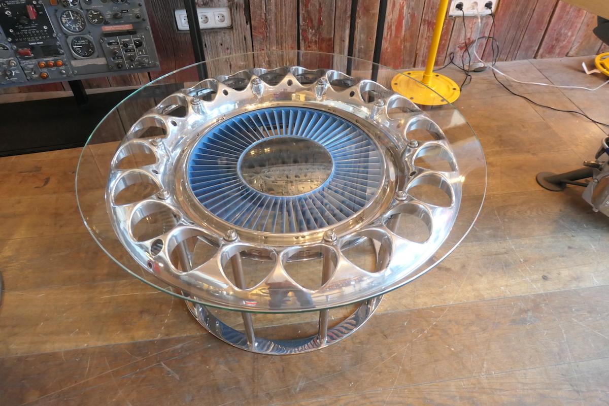 Reclaimed aircraft parts coffee table made from a ring of injectors of the combustion chamber coming from an ATAR 9 reactor manufactured by the French corporation SCNEMA and which fitted the Mirage III Dassault.
This authentic aircraft's part is