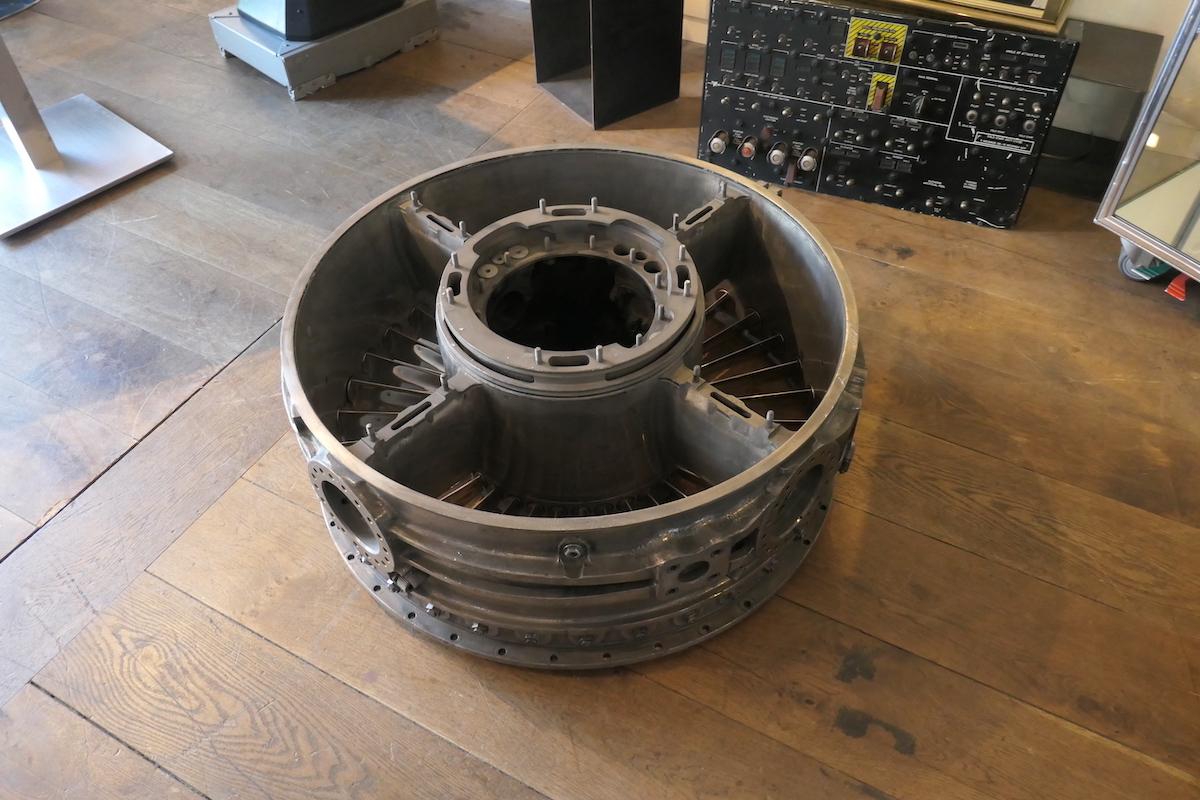 Aeronautical coffee table made from the '' intake casing group '' of an ATAR 101 reactor - this is the front visible part of the reactor - This one-of-a-kind piece has been removed from a French military Aircraft the ''Super Mystère B2'' built by