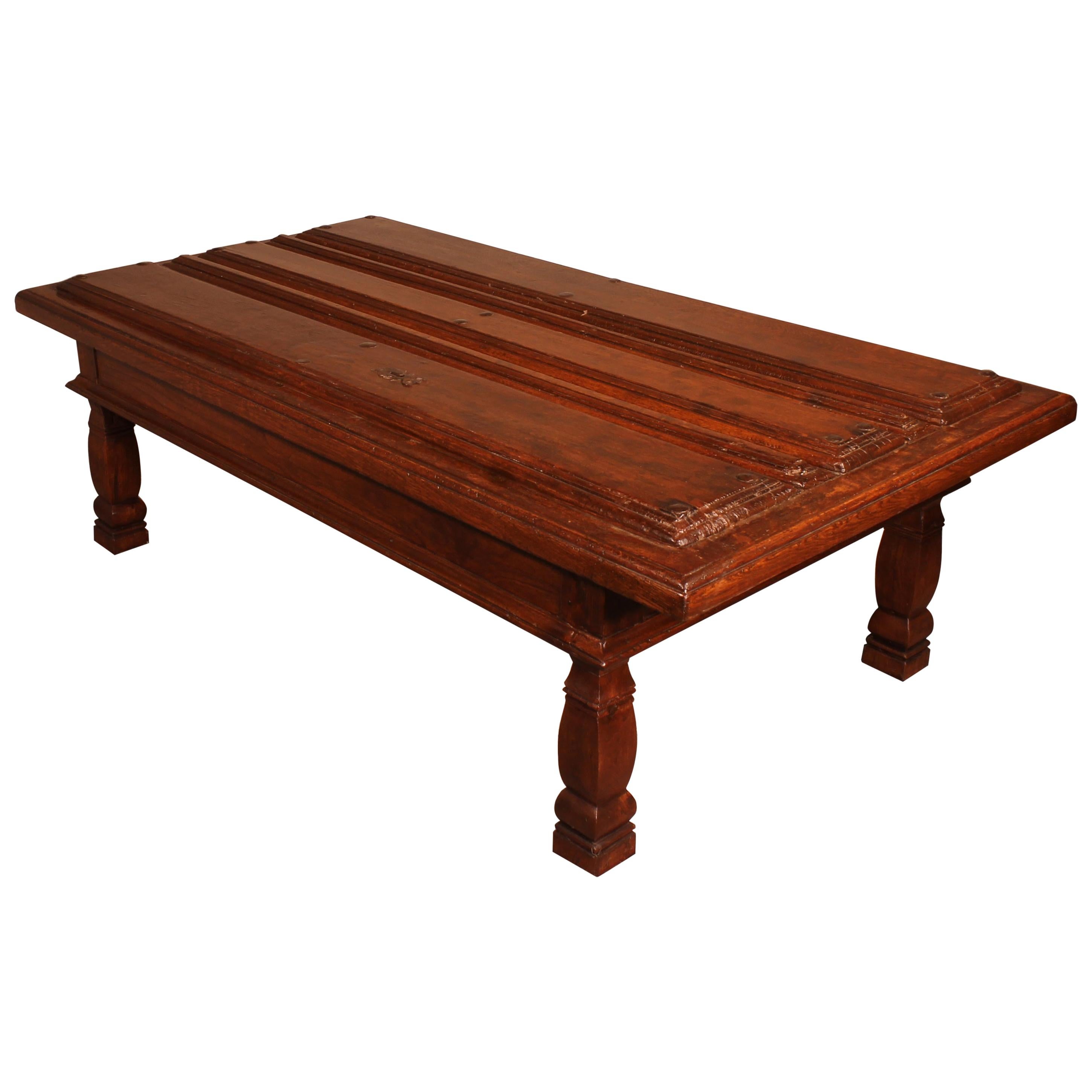 Coffee Table Made with an Old 17th Century Spanish Door in Chestnut For Sale