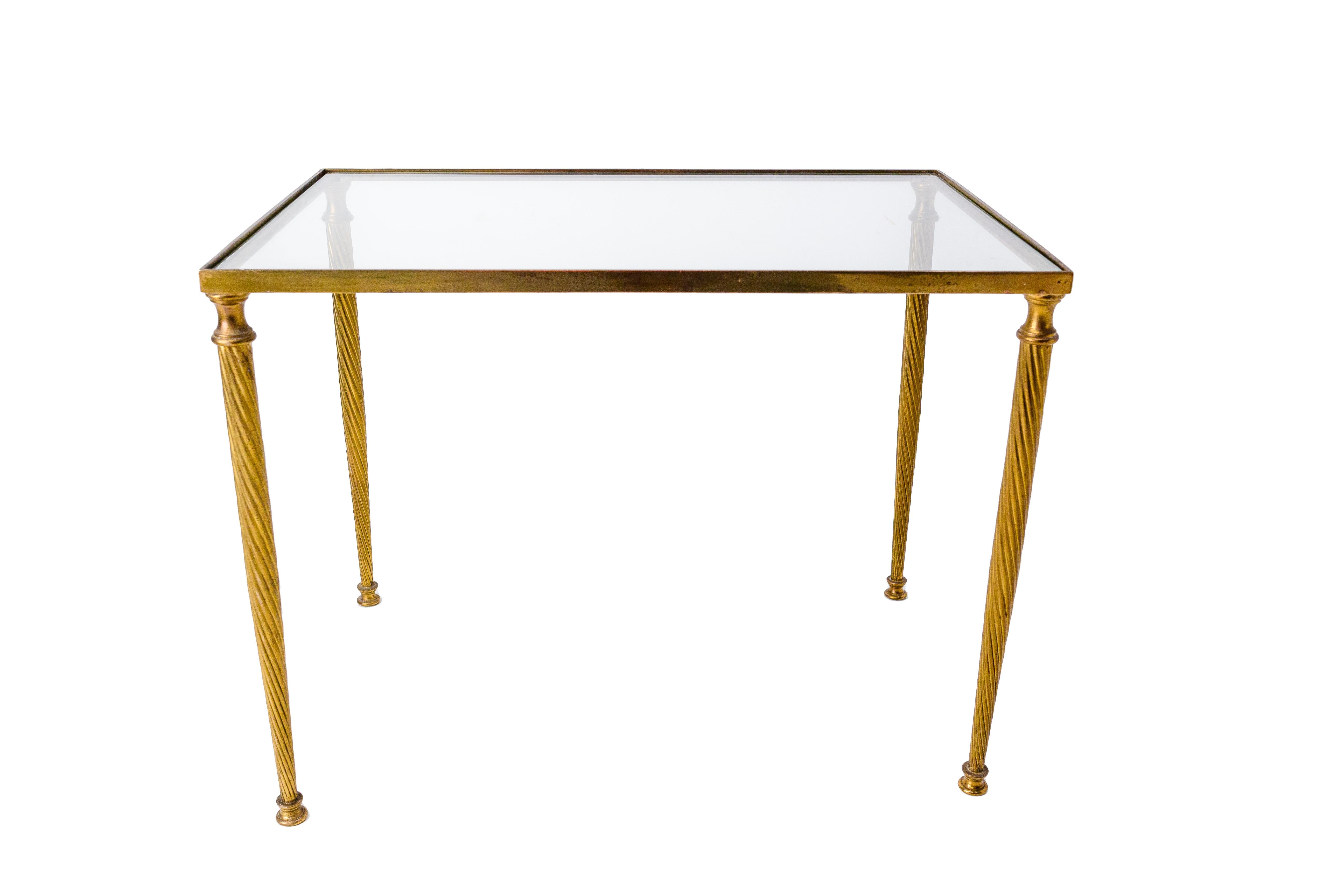 Coffee table with glass top and gilt twisted brass legs
France circa 1960
In good original condition with only minor marks with a small shard of glass in a corner, below the top (please see photo).

 

