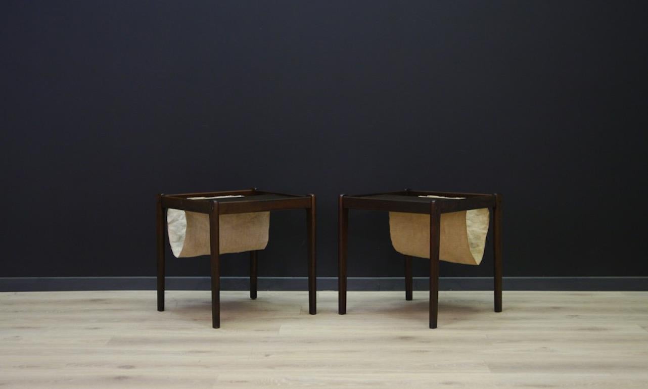 Coffee table of unprecedented form from the turn of the 1960s and 1970s, a Scandinavian design. The table legs are made of hardwood rosewood, top veneered with rosewood. Coffee table is preserved in good condition (visible small dings and scratches)