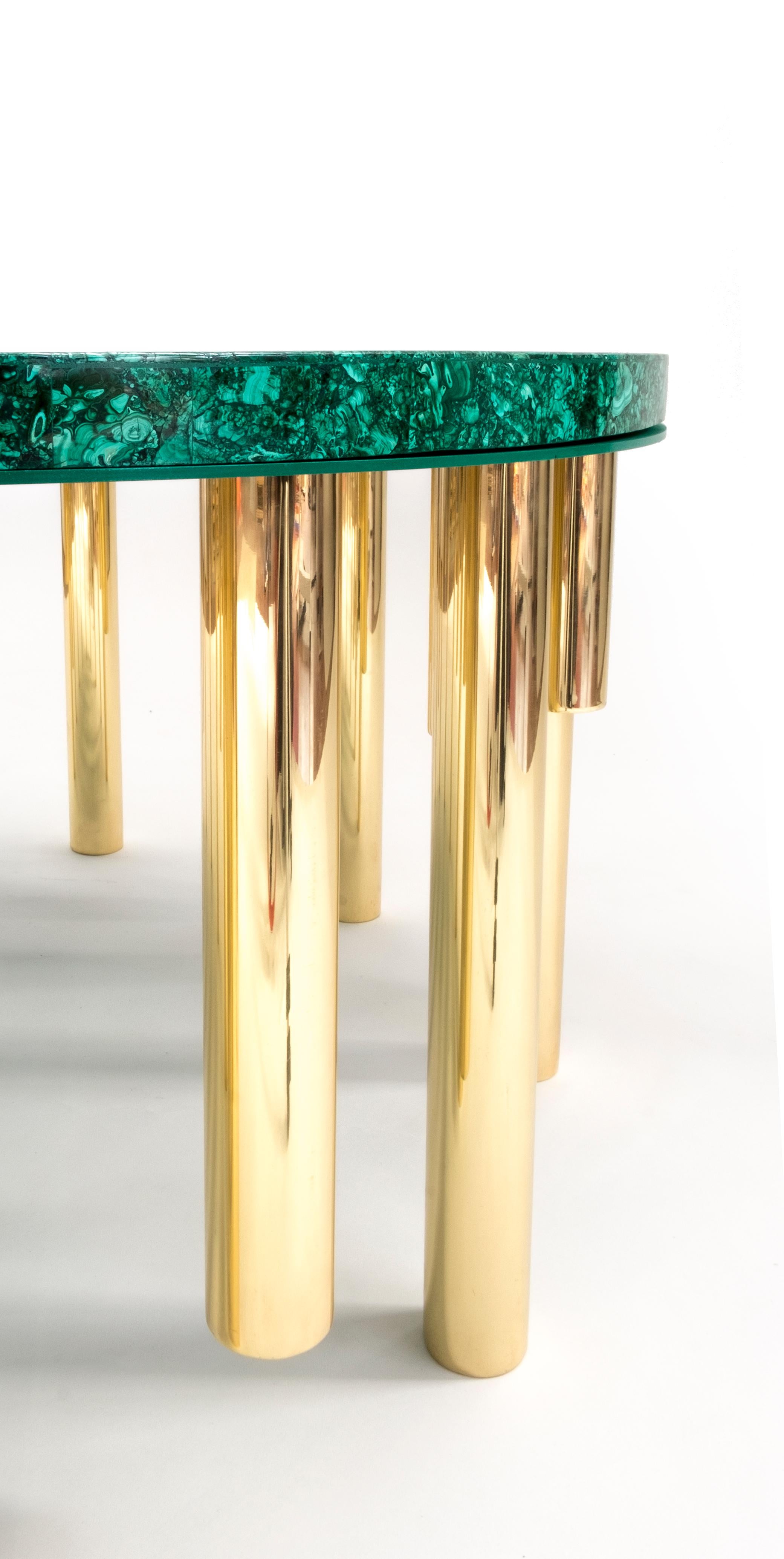 Stalattite model coffee table, 18 polished brass legs, rectangular Malachite tabletop designed and produced by Studio Superego.

Biography
Superego editions was born in 2006, performing a constant activity of research in decorative arts by