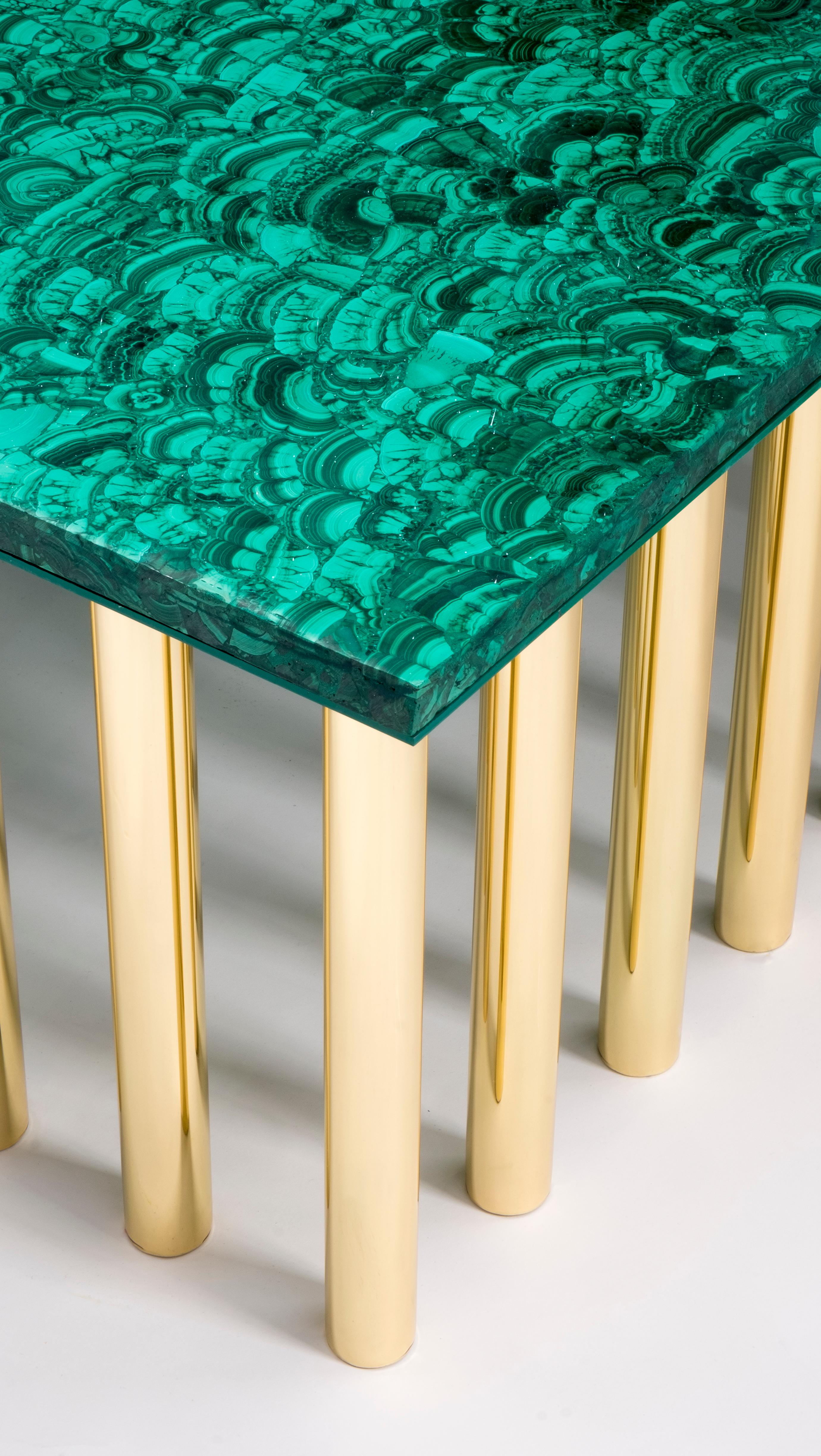Stalactite model coffee table, 32 polished brass legs, rectangular malachite tabletop designed by Studio Superego for Superego Editions.

Biography:
Superego editions was born in 2006, performing a constant activity of research in decorative arts by