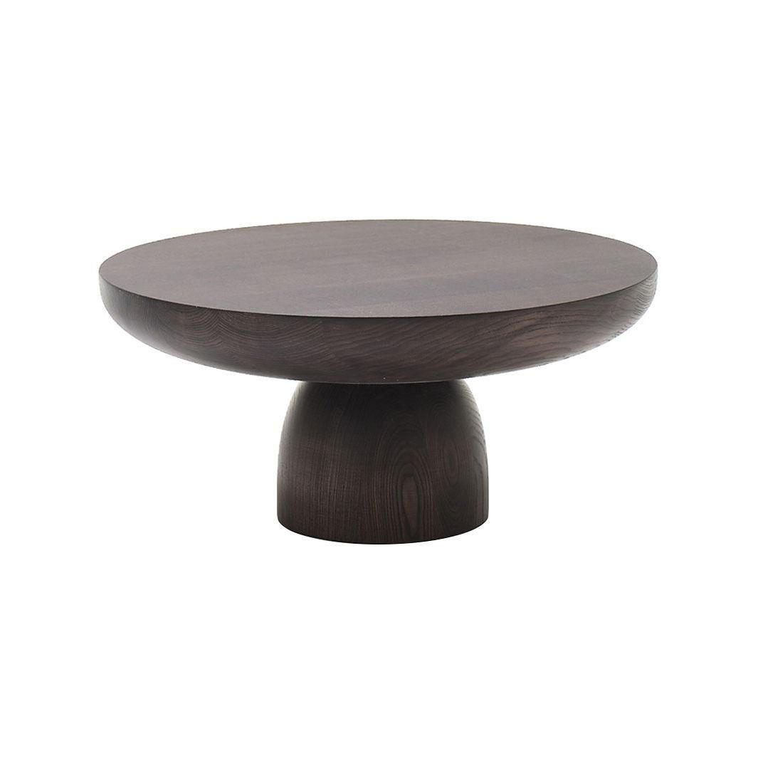 Brand: Mogg
Design: Antonio Facco
Model: Olo – Side Table

Olo by Mogg, designed by Antonio Facco, is a monolithic side table crafted from turned solid ash wood, stained moka. With its pure and solid form, Olo reflects a primitive aesthetic that