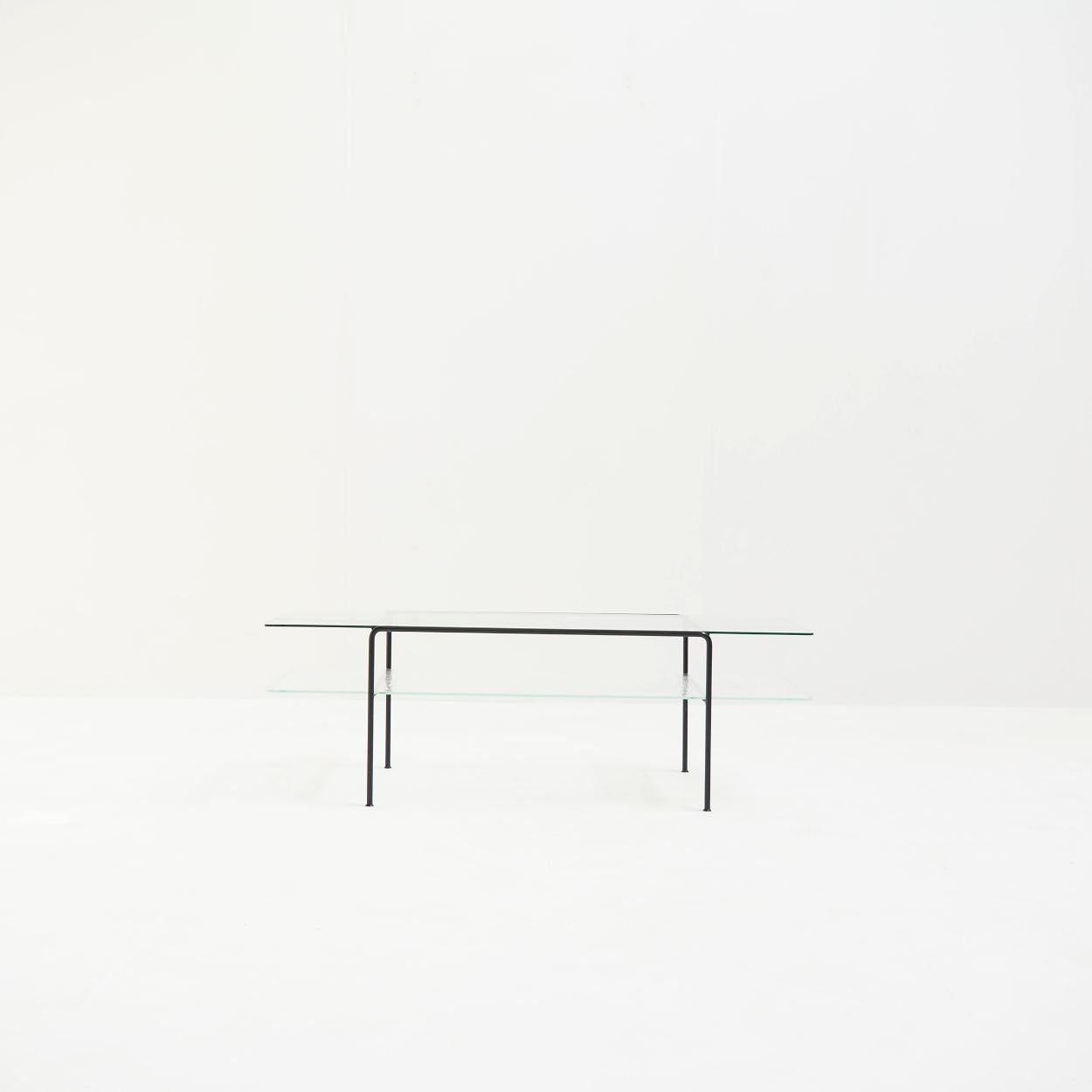 Rectangular coffee table, designed in the 1950s by A.R. Cordemeijer for the Dutch manufacturer Gispen, which, due to its simplicity and use of materials, fits in perfectly with the modern furniture of that time.

The table has a solid steel frame