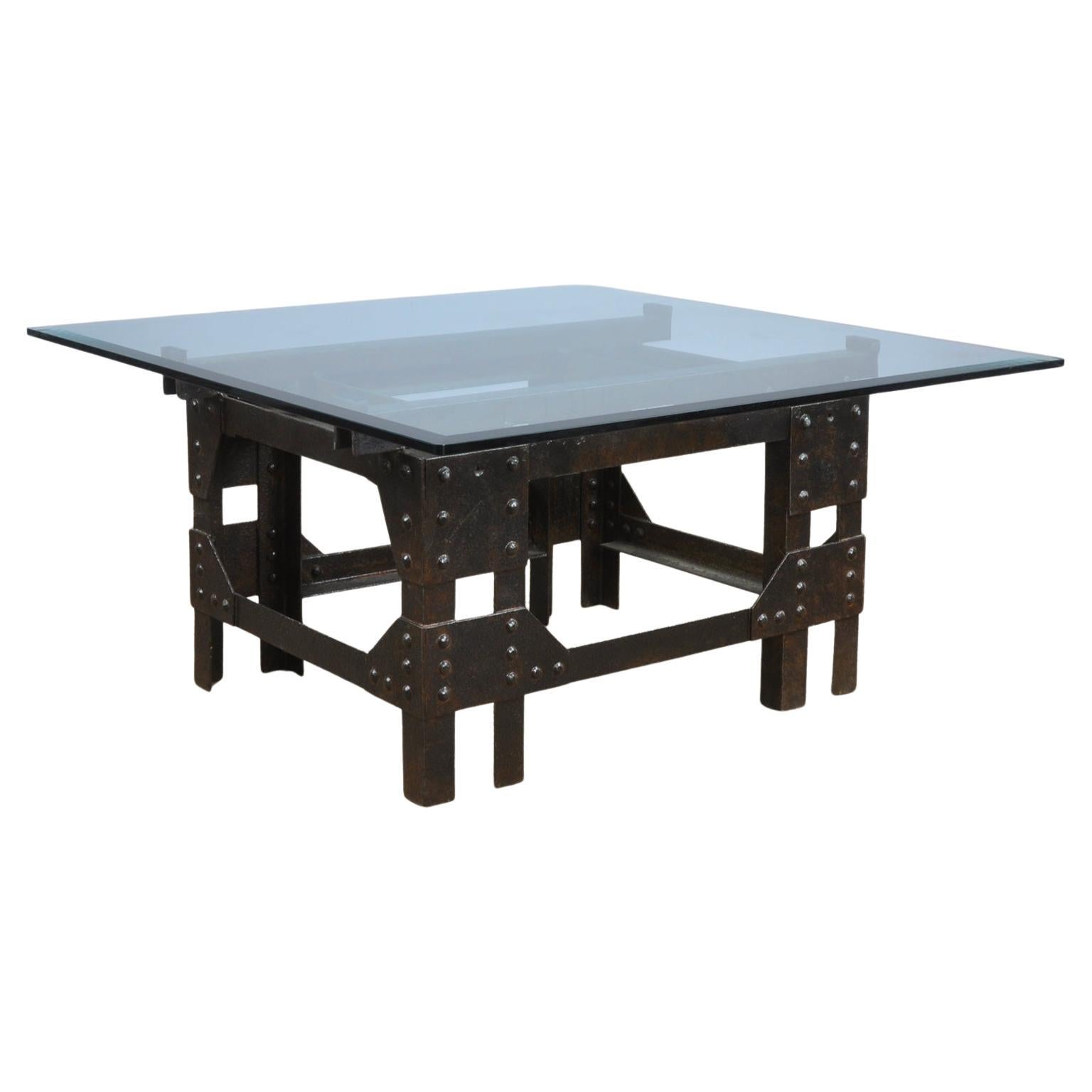 Table basse en fonte et plateau en verre