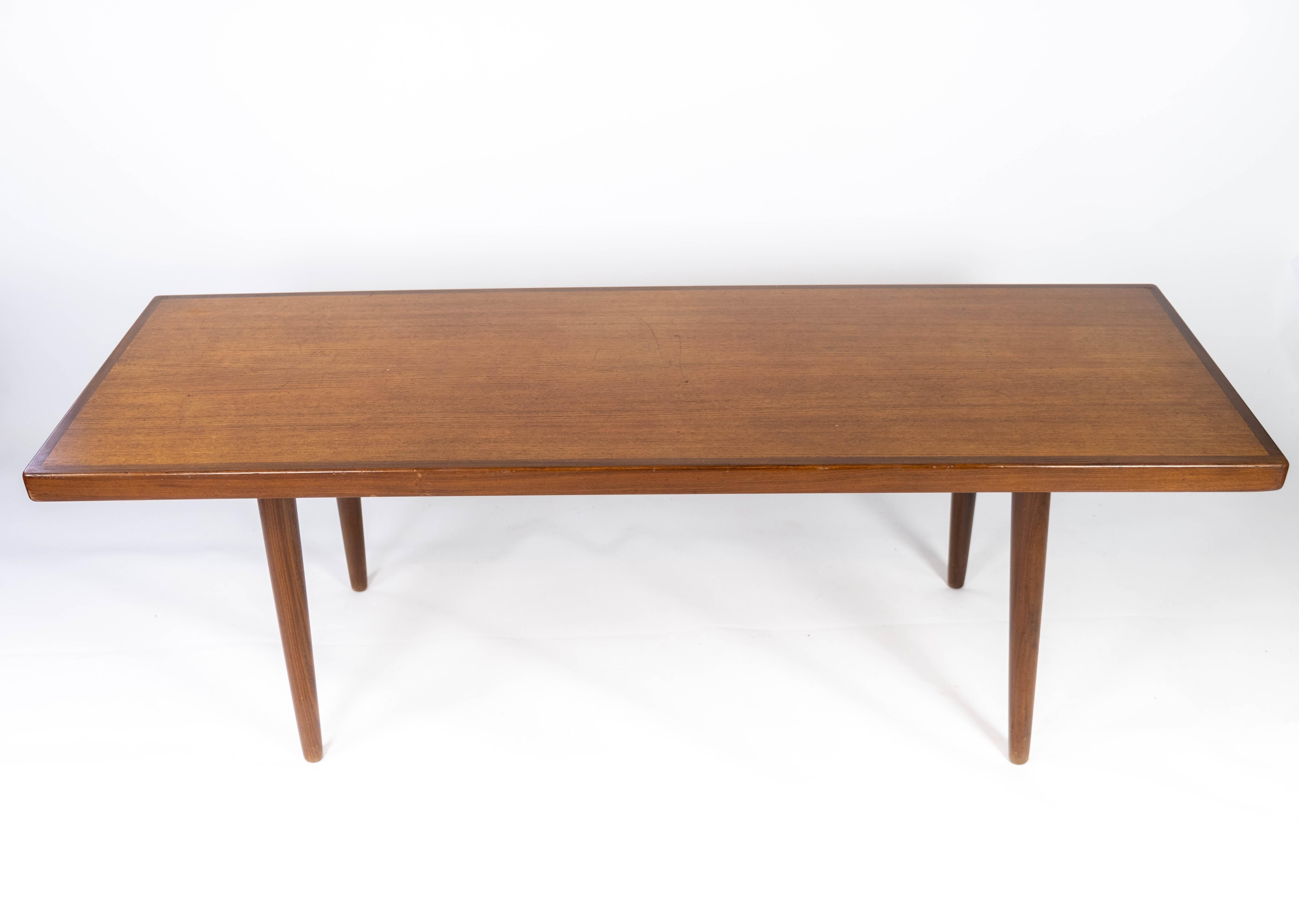 
This teak coffee table epitomizes the elegance and craftsmanship of Danish design from the 1960s. Crafted with precision and attention to detail, it boasts a timeless appeal that adds sophistication to any living space.

The rich tones and grain