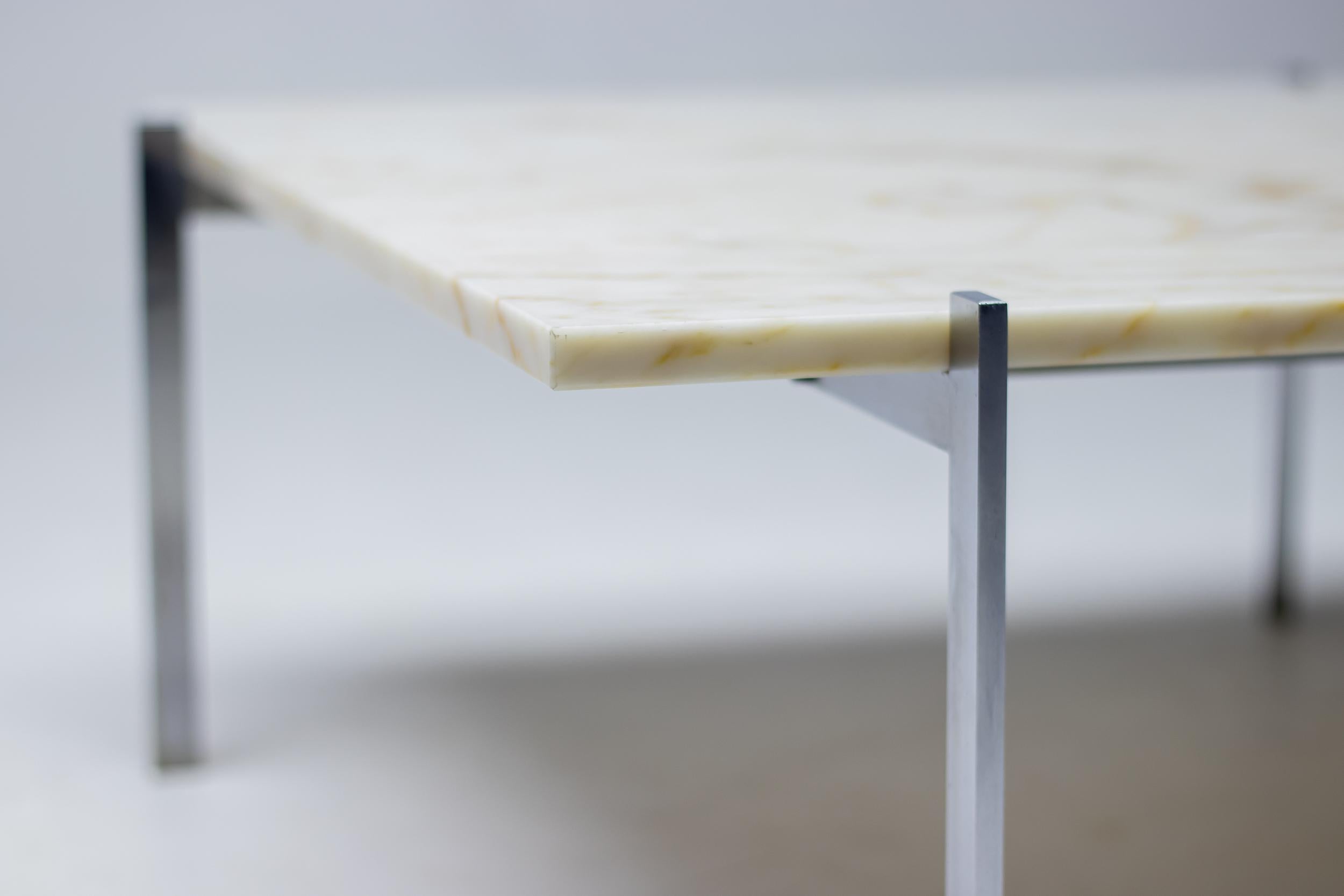 Poul Kjærholm for E. Kold Christensen PK61 occasional table, white marble and steel, made in Denmark, designed in 1955. 
Marked with E. Kold Christensen logo in the frame.

This table by Kjærholm is the epitome of minimalistic yet monumental