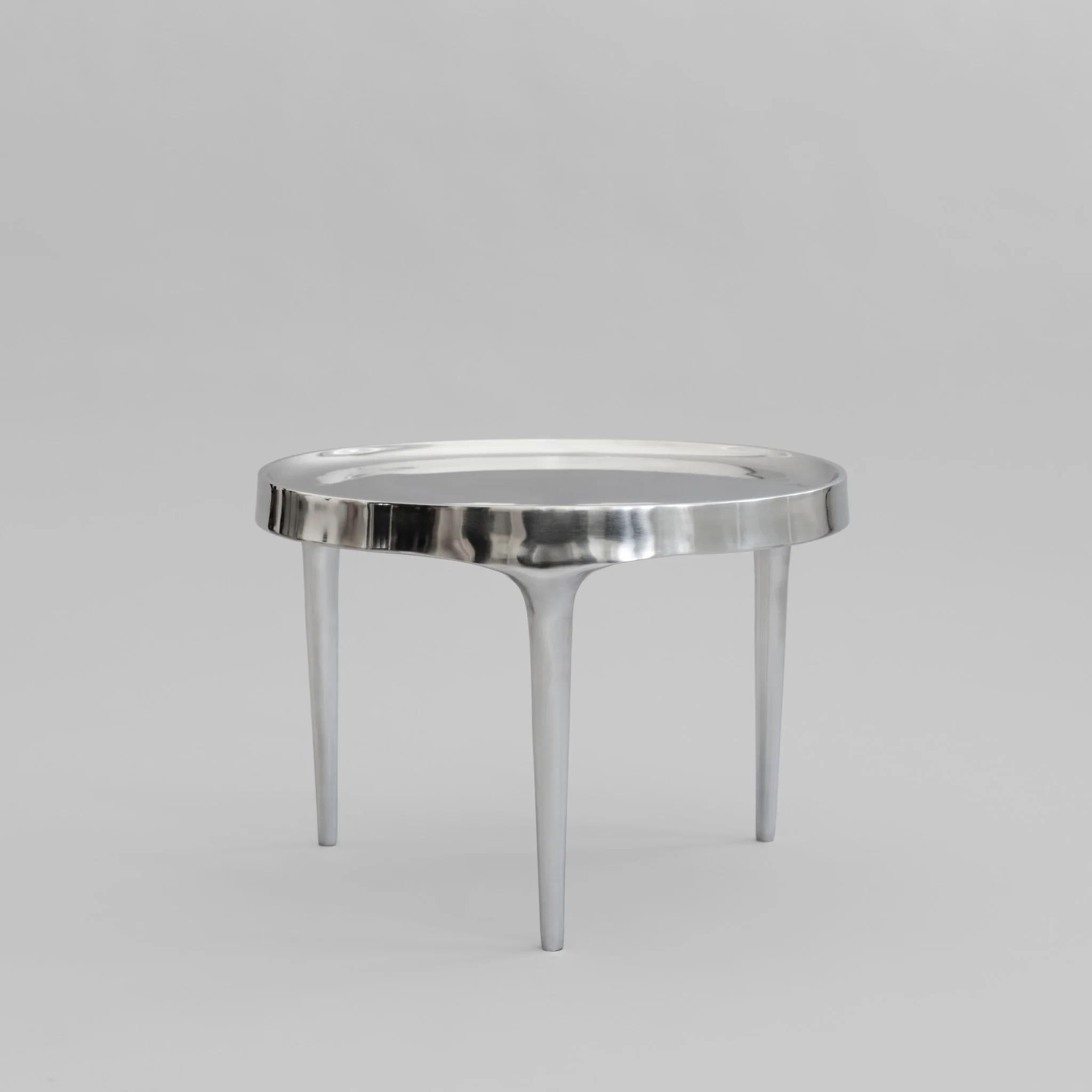 Coffee table, polished cast aluminium and chrome, contemporary work.

Coffee table in cast aluminium with chrome finish. This pretty coffee table is made from polished aluminium in a chrome finish with a mirror-finish surface, offering an elegant,