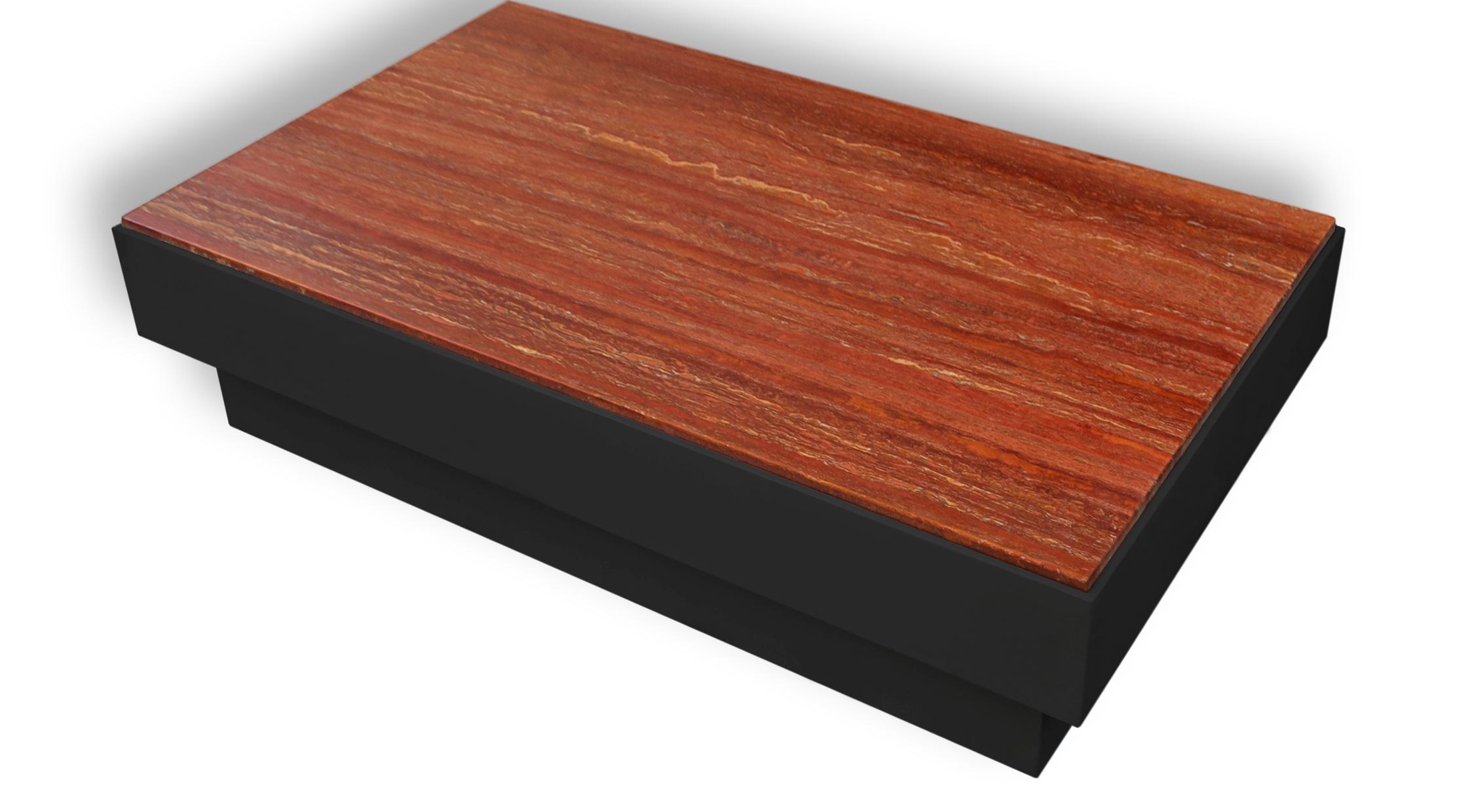 This coffee table has been manufactured with a Red Travertine Top, with a glossy finishing . The base in black lacquered wood with geometrical shape 
Size: cm. 132 x 99 h. 32
Inches: 51.97
