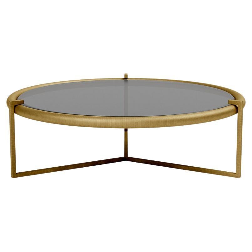 'Rua Tucumã' Coffee Table by Man of Parts
Signed by Osvaldo Tenório 

Burnished Gold or Burnished Bronze frame  
Smoked Glass (Tempered) top 


Dimensions available:
- Low - H. 28 x D.90 cm
- High - H. 38 x D. 90 cm


Model shown: Burnished Gold