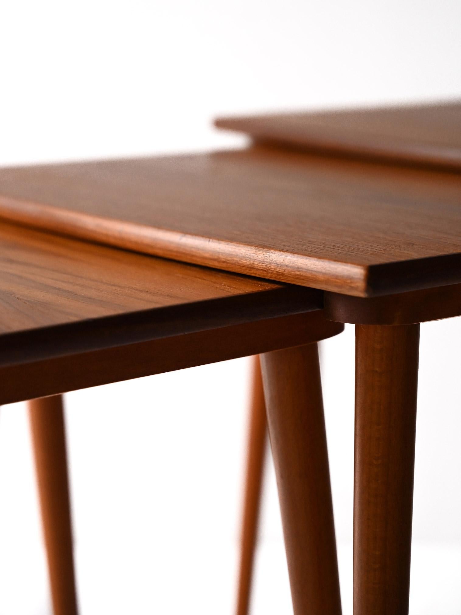 Teak Scandinavian slide-in coffee table For Sale
