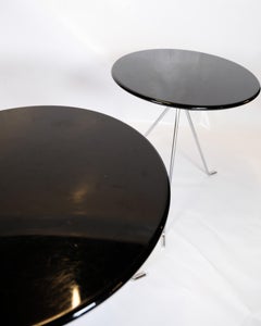 Coffee table set consisting of 3 small round tables with chrome legs