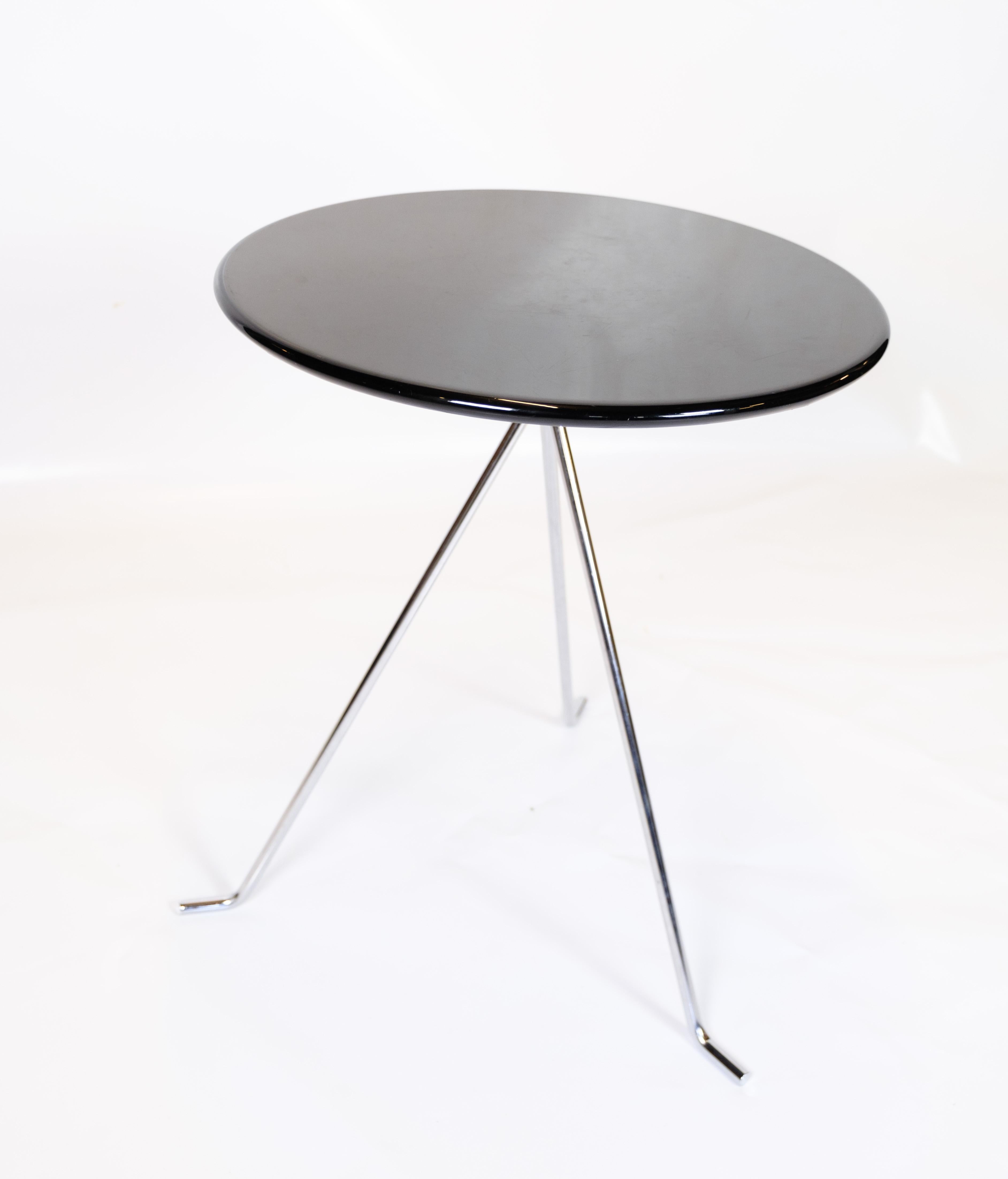 Chrome Coffee table set consisting of 3 small round tables with chrome legs  For Sale