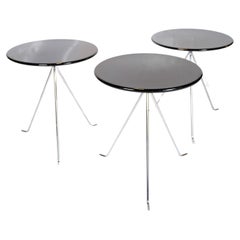 Coffee table set consisting of 3 small round tables with chrome legs