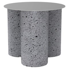 Table basse en acier inoxydable et pierre volcanique de lave