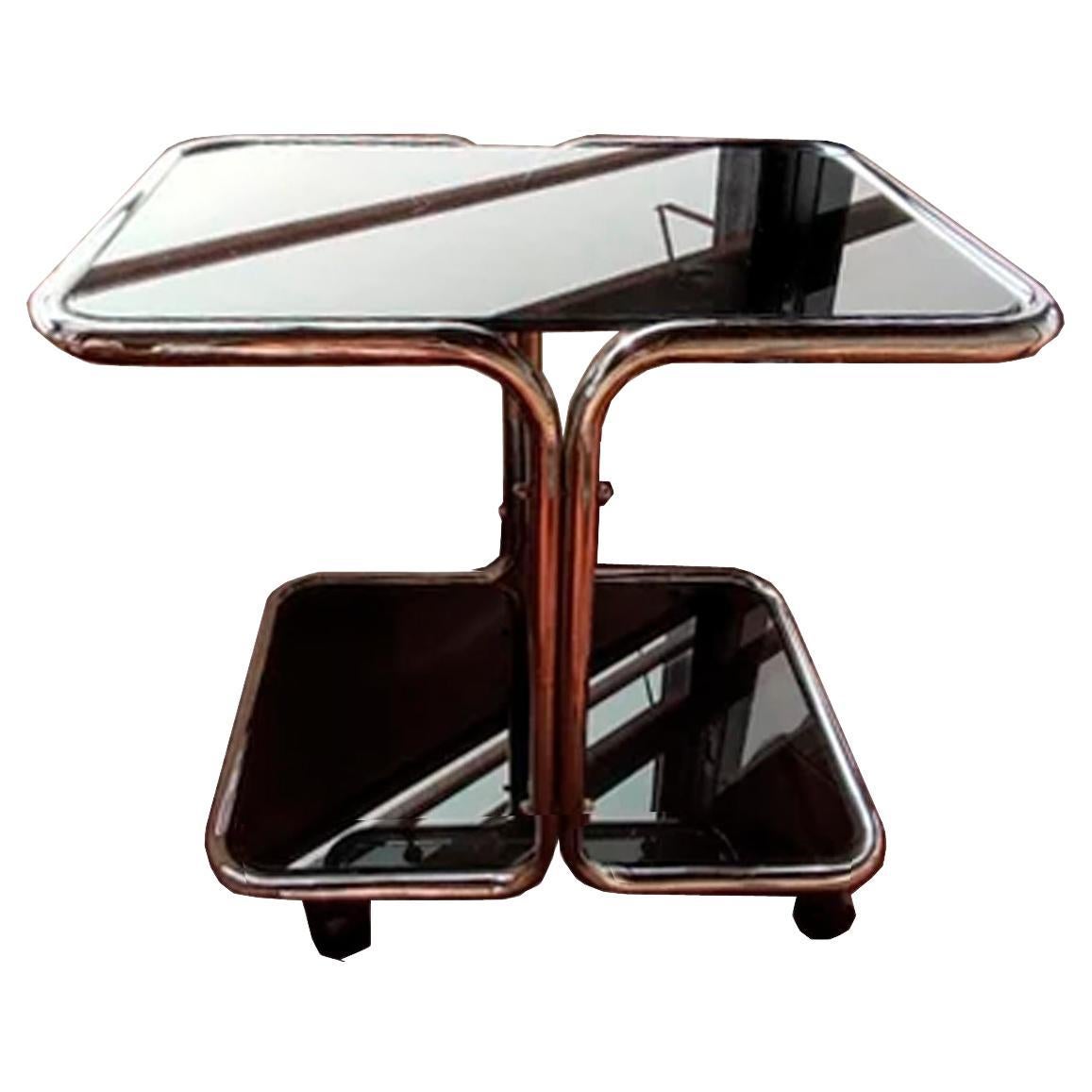 Coffee table steel tube and smoked glass with wheels Italy 70s