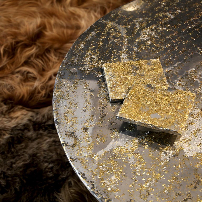 In stock: This contemporary coffee table is a unique piece, created by Xavier Lavergne and made of melted pewter with brass grains, embedded in resin and polished like a marble. The table is handmade in France. Each piece is unique and sold with its