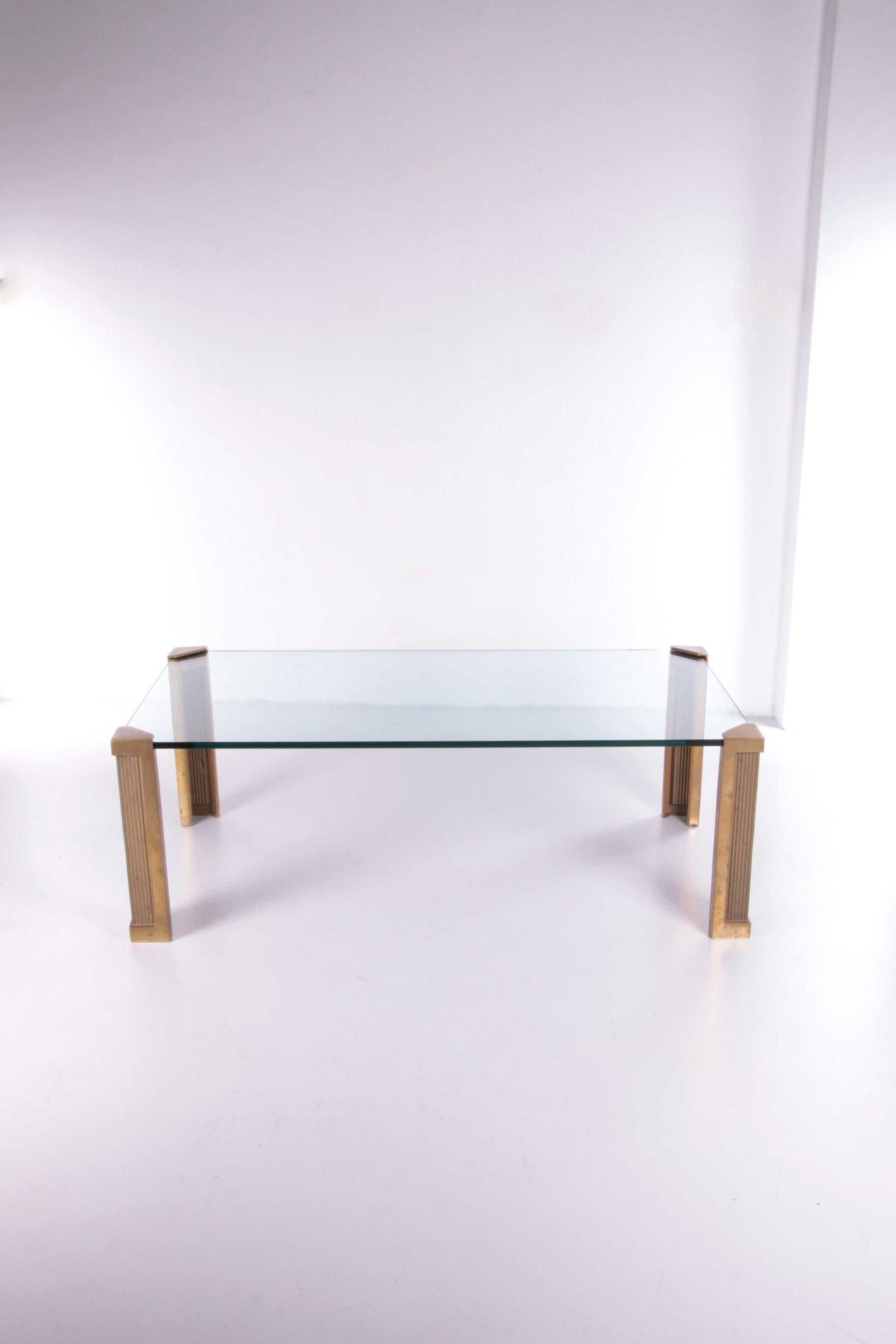 Coffee table T14 design by Peter Ghyczy 1970s.


This is a beautiful coffee table with the original legs of the designer Peter Ghyczy (model t 14). There are different models. Check our website for this.

The legs are made of bronze and brass.

The