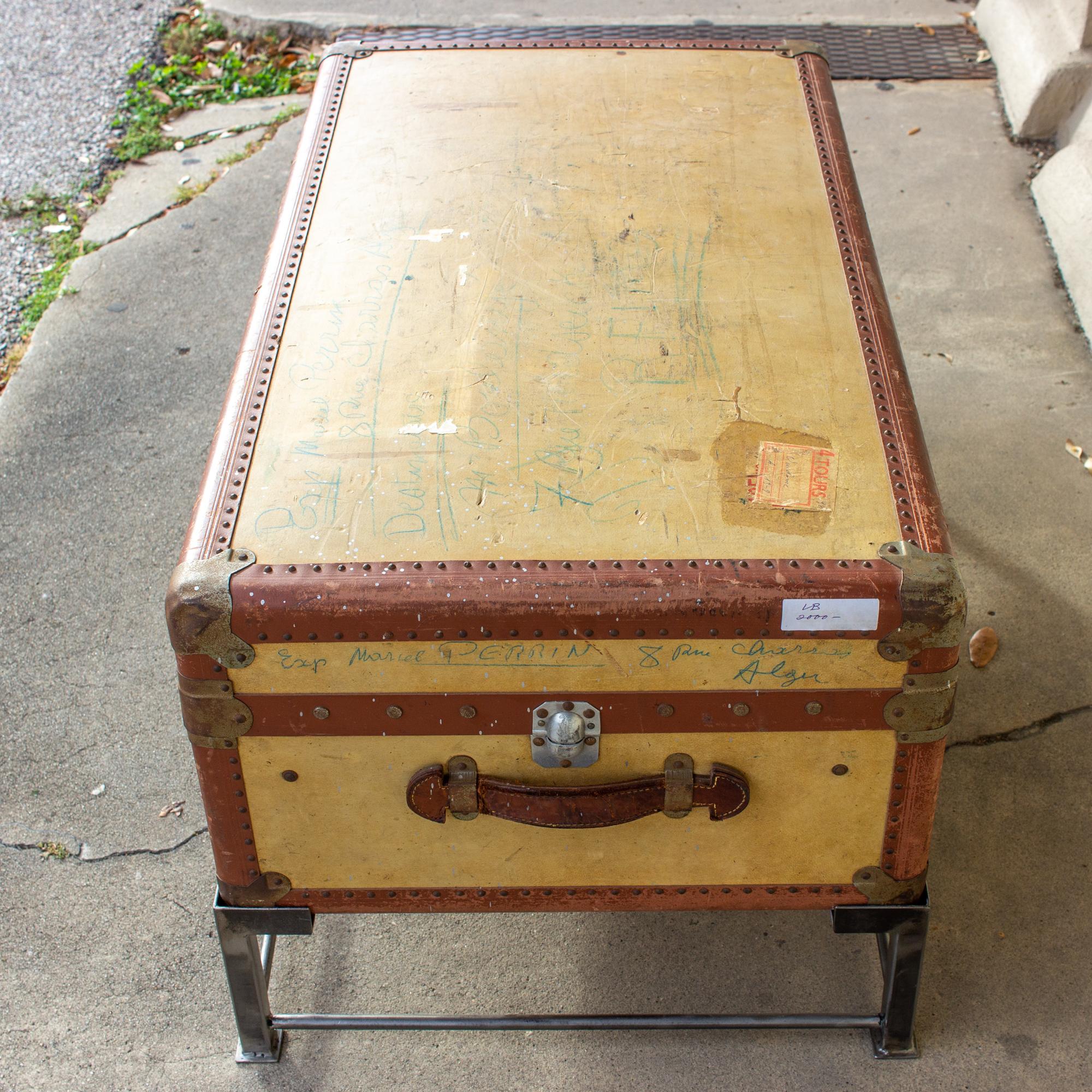 Coffee Table Crafted with Vintage French Luggage and Custom Iron Base 1