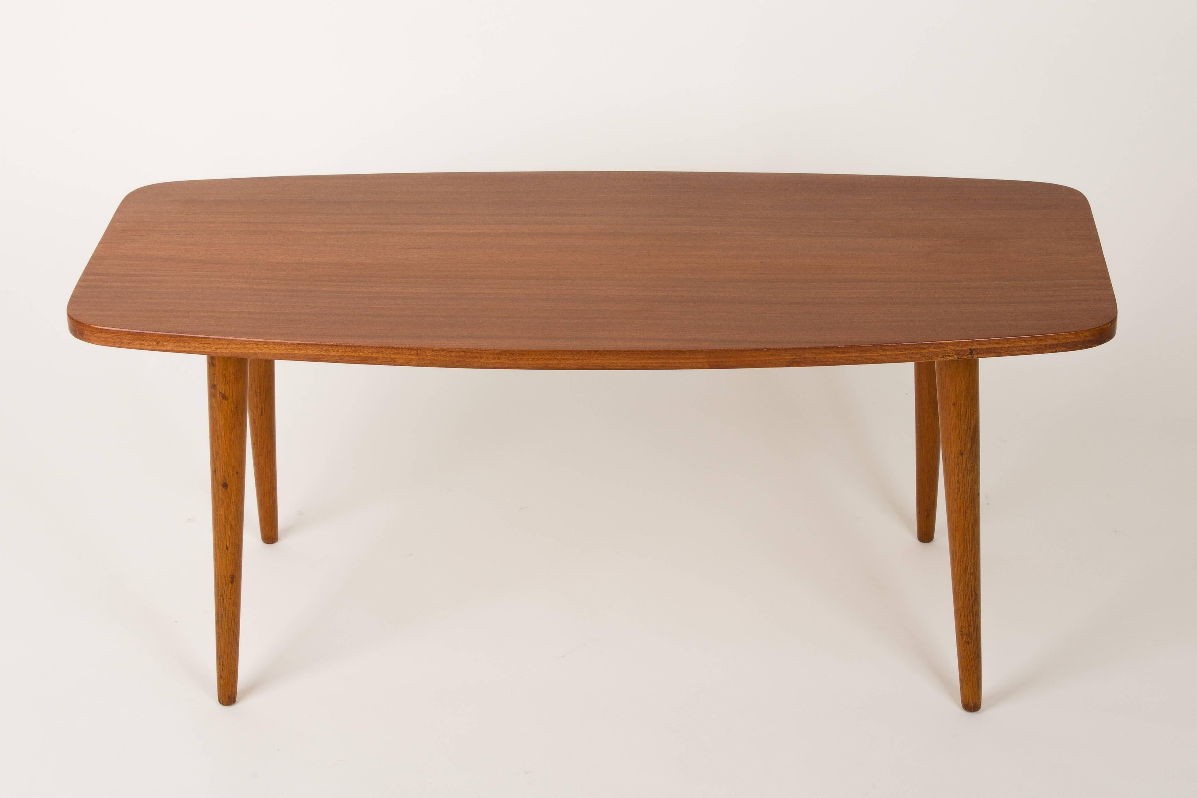 Small coffee table from the 1960s. It was manufactured in Breslau by the Craft Cooperative Supply and Sales. The table was made of wood and veneer plywood, it was also full renovated. Excellent condition.