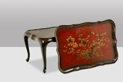 Coffee table with a removable top, made of red and black lacquered wood. 1950s.