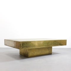 Coffee table with a wooden frame covered in gilded brass plates Rodolfo Dubarry