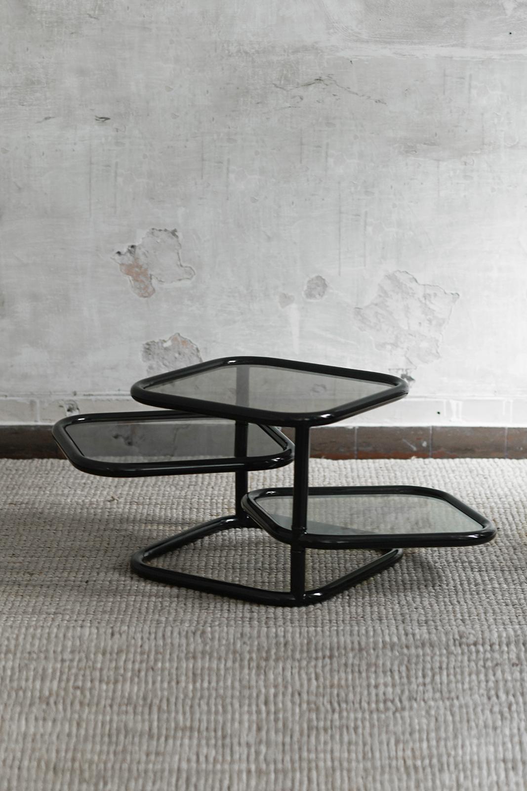 Glass and black metal coffee table with adjustable tops, in the style of Milo Baughman, 1970s
Product Details
Dimensions: 50 W x 41 H x 50 D cm