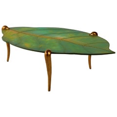 Coffee Table with Cast Alluminium Legs Gold Finish Hard Leather Top