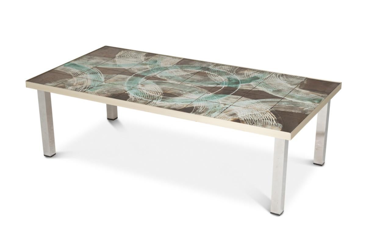 Coffee table with ceramic top supported by a polished metal base.

French work from the 1970s.

Dimensions: H 35 x W 121 x D 61 cm

Reference: LS6522307M