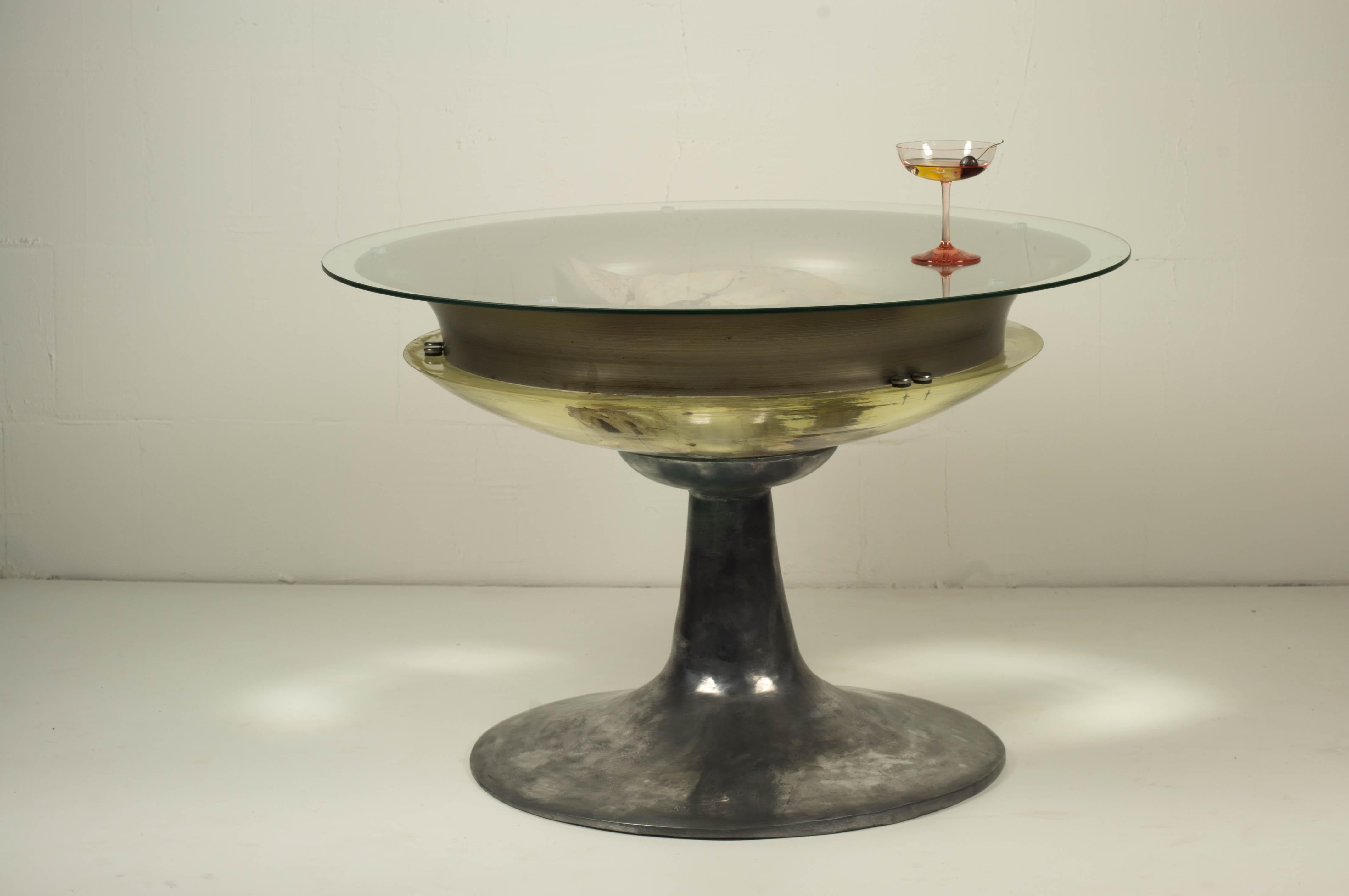 One of a kind coffee table hand made of aluminum resin metal and glass.
Eye-catching design piece!