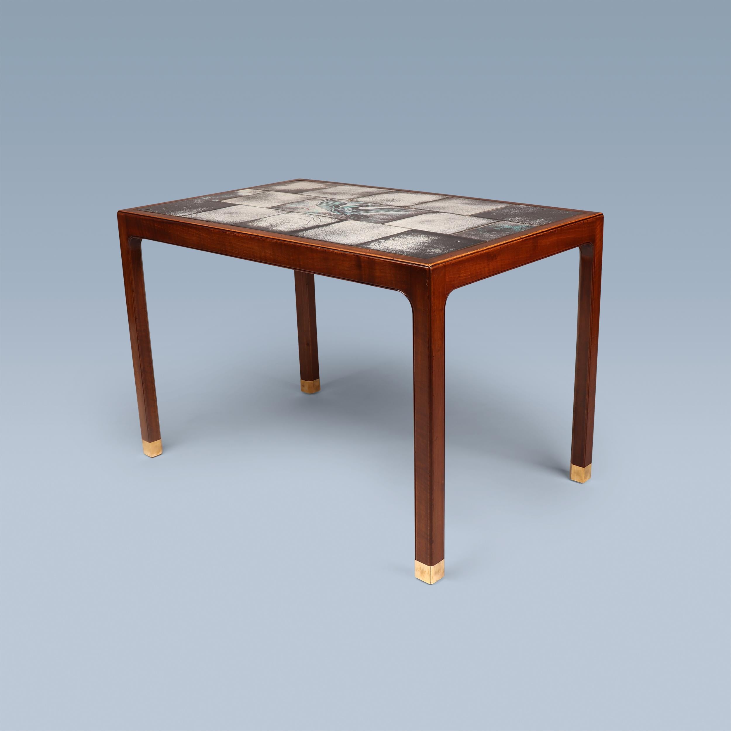 Scandinavian Modern Coffee table with black/white inlaid tiles, turquoise details and brass feet. For Sale