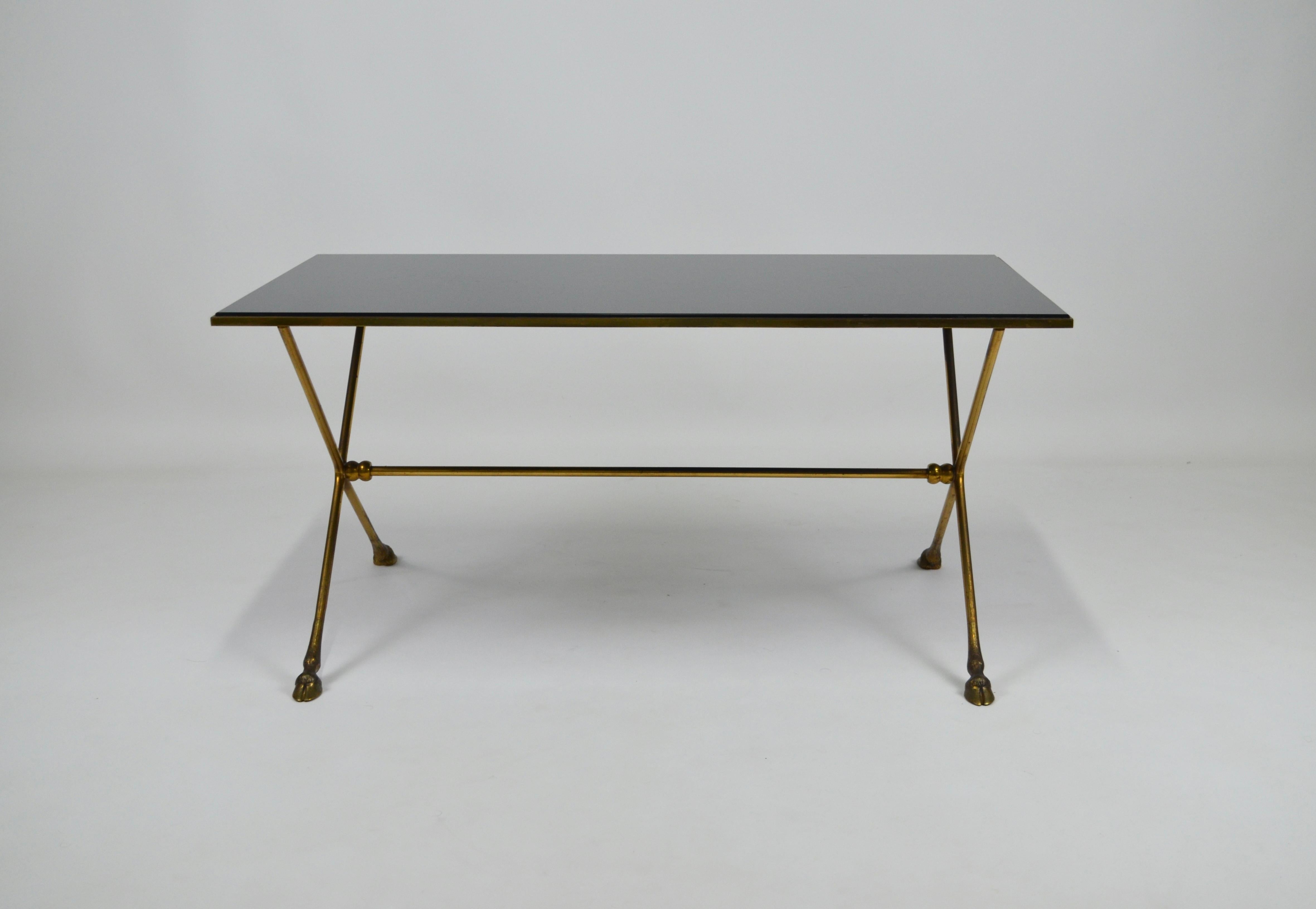 Mid-20th Century Coffee table with hoof-shaped legs attributed to Maison Jansen For Sale