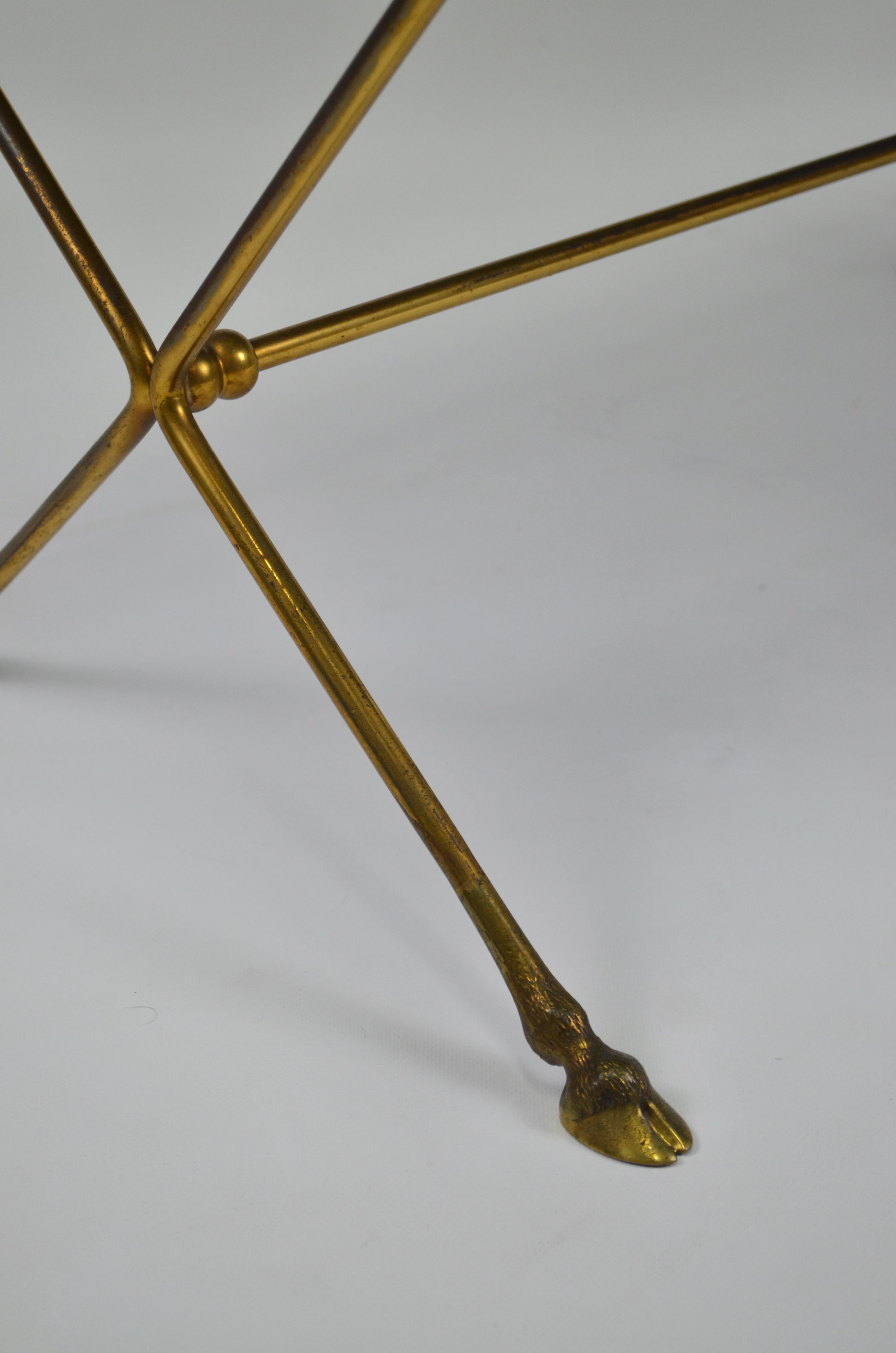 Brass Coffee table with hoof-shaped legs attributed to Maison Jansen For Sale