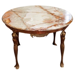 Coffee table with mermaids and onyx top