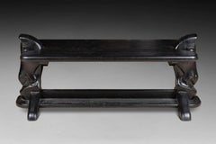 COFFEE TABLE with rectangular top. The feet surmounted by horse heads circa 1970