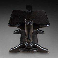 COFFEE TABLE with rectangular top. The feet surmounted by horse heads circa 1970