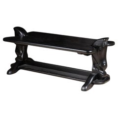 COFFEE TABLE with rectangular top. The feet surmounted by horse heads circa 1970