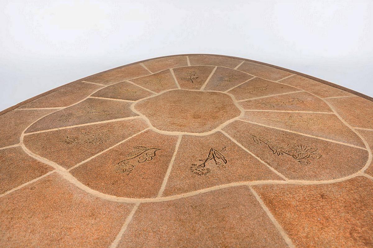 Botanical Tile Top Low Coffee Table by Vallauris, the coffee table is in dark stained oak and ceramic, signed Barrois, for Vallauris. Unusual shape stands on three-legged cylinders. Brutalist design. Signed on one of the tiles. France, circa 1950.