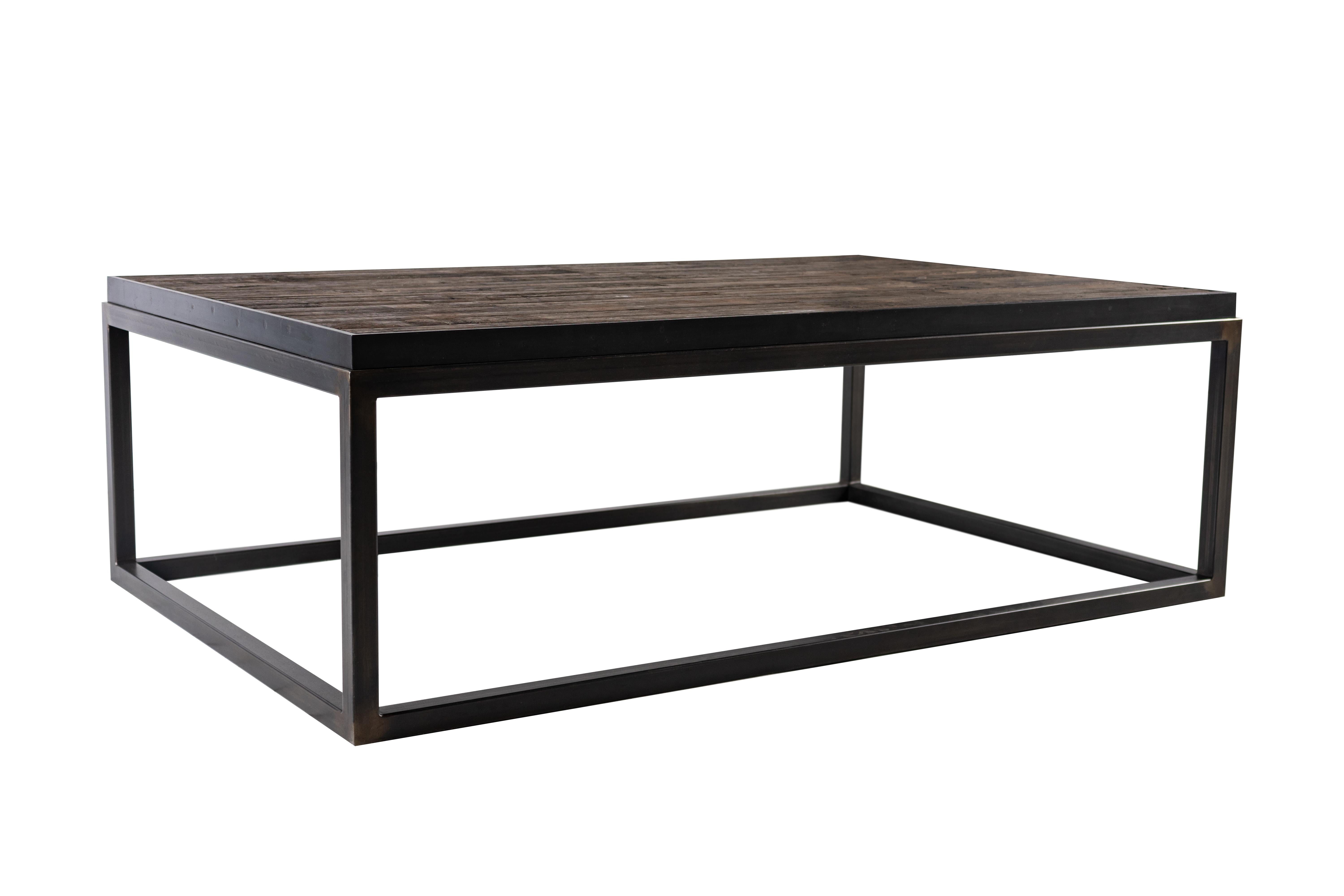 We have created a one of a kind product that will be the centrepiece of any living space. This design was entirely handmade, and showcases the beauty of creating something from reclaimed oak and ebony patina steel base materials. In a world of