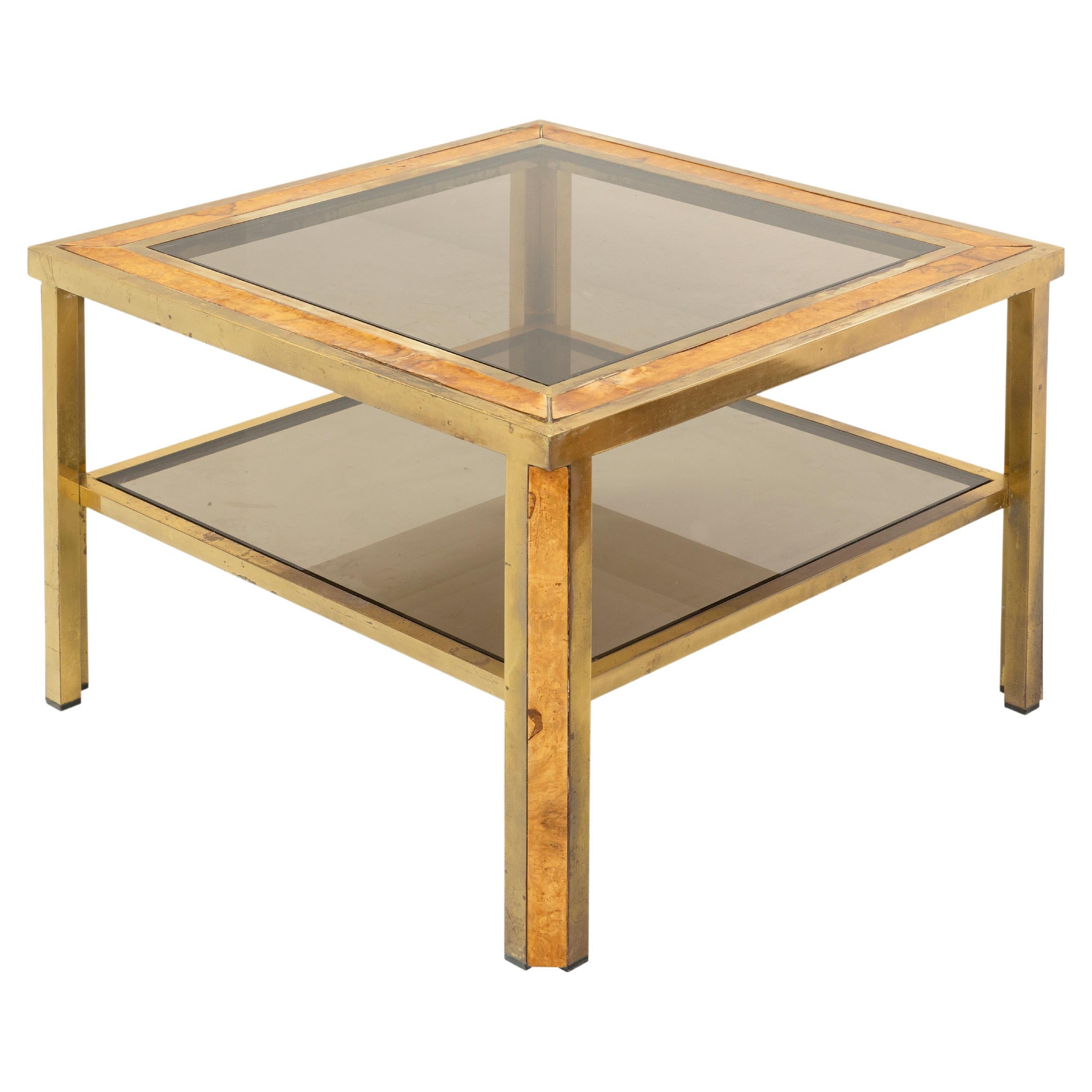 Coffee table with two brass shelves and briarwood details, smoked glass tops. 