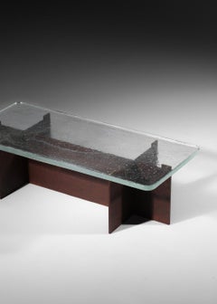 Couchtisch mit transparenter Glasplatte im Vintage-Stil und modernem Stahlgestell