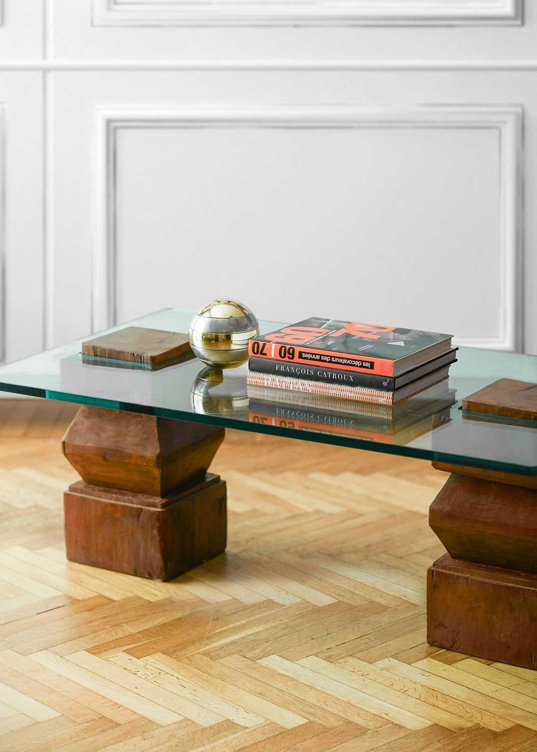 European Coffee table with wooden bases and glass top For Sale