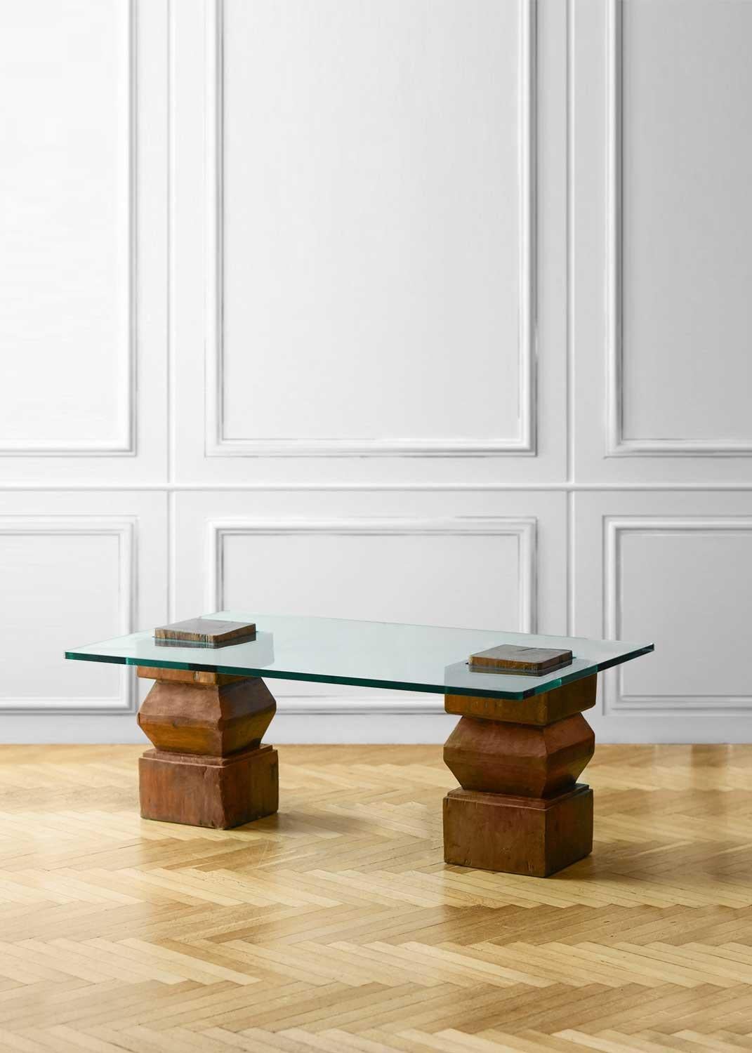 Coffee table with wooden bases and glass top For Sale 1