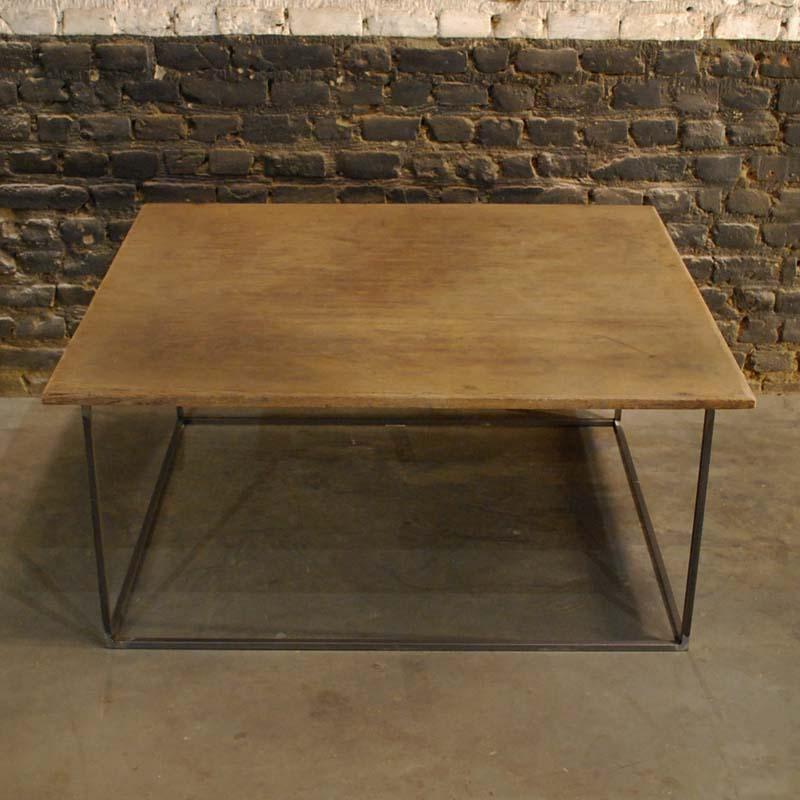 This coffee table has a top that is made from one piece of timber made in the 19th century.
The top has a Fine beveled edge and a beautiful worn patina. The top originates in Sumatra Indonesia and is presumably used as a worktable to produce Fine