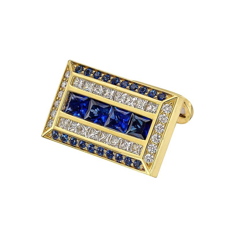 Sapphire and diamond rectangular-shaped cufflinks, centering a row of square-cut sapphires flanked by a row of round brilliant-cut diamond on either side and trimmed by a round sapphire and diamond frame. Handcrafted in 18k yellow gold. 32 sapphires